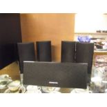 An Onkyo powered Sub Woofer SKW-501 with speakers and speaker stands, with remote and