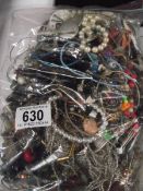 A bag of mixed costume jewellery