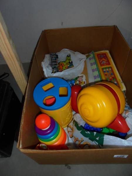 A large box of vintage Early Learning toys.