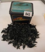 A blue star lines vintage tin containing plastic soldiers