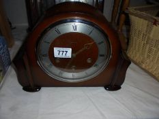 A 1930's oak mantle clock.