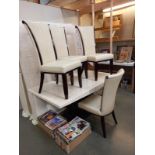 A modernist white marble effect dining table and 4 white leather chairs