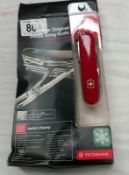 A boxed Victorinox 33 function Swiss champ original Swiss army knife, new but box is slightly a/f