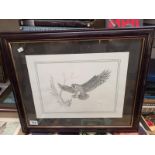 A black and white print of an owl in flight by C Varley 58cm x 48cm