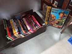 A good look of books, including Dan Dare, Desperate Dan etc