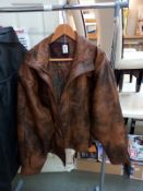 A brown Italian leather jacket size M