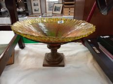 A large art glass bowl in brass and iron stand, diameter 39cm x height 23cm