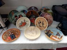 A quantity of boxed collectors plates