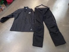 A Hein Gericke bikers rain jacket size L and trousers size XXL