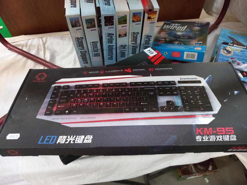 A quantity of boxed Microsoft flight simulator games and 2 keyboards - Image 3 of 9