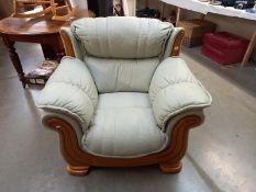 A teak framed leather armchair