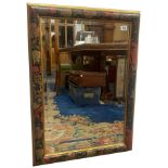 A large TiaraCraft mirror with a William Morris style frame