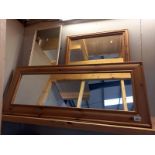 2 pine framed mirrors and 1 other