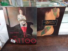 2 books on tattoo's
