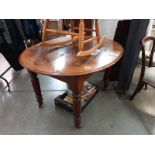 A Victorian Mahogany extending dining table (2 leaves darker as not been used)