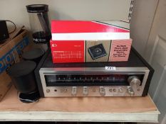 A Pioneer SX-690 fm/am stereo receiver and various speakers and boxed car speakers