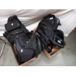 A selection of motorcyclist back packs/ruck sacks etc