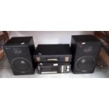 A Technics 5A-K6L cassette/radio and tuner and 2 Technics SBF5 speakers