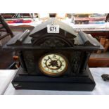 An old style mantel clock, springs ok. (no key or pendulum)