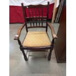 An Edwardian carver chair