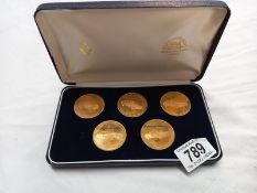 A cased vintage Renault launch date 1986 medallion set