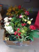 A box of faux flowers