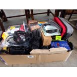 A box of miscellaneous electronic items including leads etc.