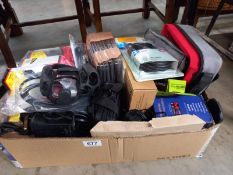 A box of miscellaneous electronic items including leads etc.