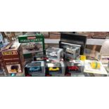 8 boxed Schuco 1/87 scale model cars including Porsche, Mercedes, A C Cobra etc and piano money