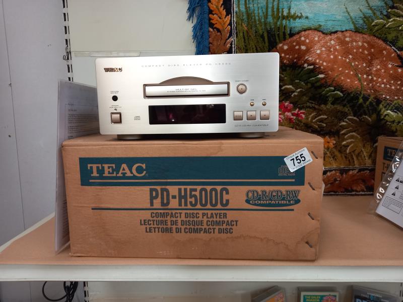 A boxed Teal PD-H500L compact disc player