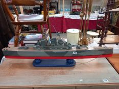 A large solid wooden scratch built model of a battleship Length 113cm collect only