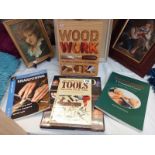 A selection of books on wood work including tools and woodturning
