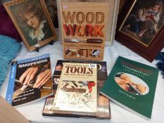 A selection of books on wood work including tools and woodturning