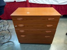 A teak effect melamine bedroom chest of drawers