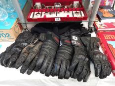 A selection of used motorcycle gloves, size L and XL