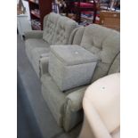 A green fabric 2 seater settee, chair and foot stool