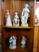 Five good bisque porcelain figures.