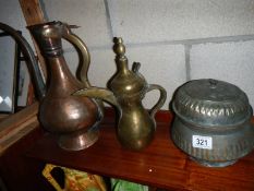 Three old copper jugs etc.,