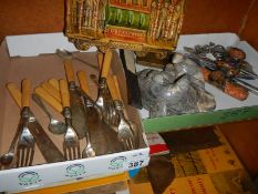 Two boxes of miscellaneous including seal figure, hand fan etc.,