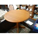 A small circular teak side table. COLLECT ONLY.