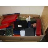A box of assorted jewellery boxes.
