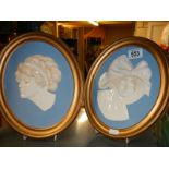 A pair of old porcelain plaques.