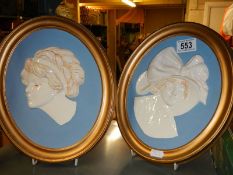 A pair of old porcelain plaques.