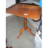 A mahogany tripod table. COLLECT ONLY.