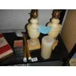 A pair of table lamp bases, candles etc.,