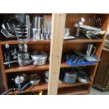 A large mixed lot of metalware - teapots, pans etc.,