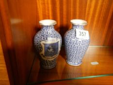 A pair of Sutton in Ashfield vases by Kenilworth, a/f.