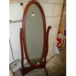 A mahogany cheval mirror. COLLECT ONLY.