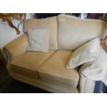 A good two seat sofa on brass castors, COLLECT ONLY,.