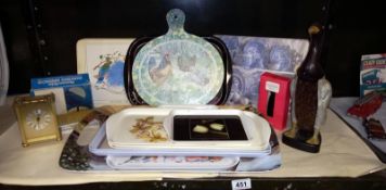 A quantity of various household items including clocks, mirrors, brushes, trays & place mats